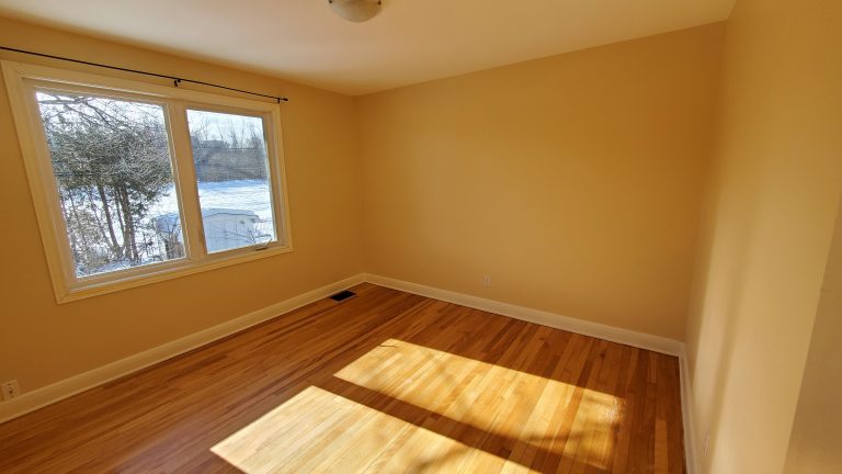 Bedroom 3 (11`x 11'3") - windows facing back yard