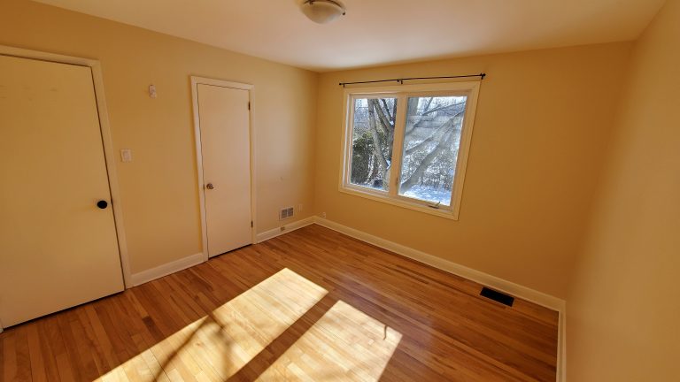 Bedroom 3 (11`x 11'3") - windows facing back yard
