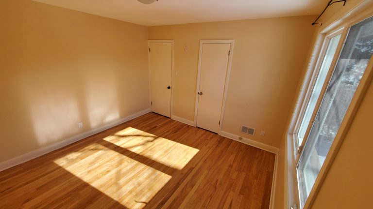Bedroom 3 (11`x 11'3") - windows facing back yard