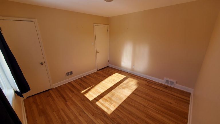 Bedroom 3 (11`x 11'3") - windows facing back yard