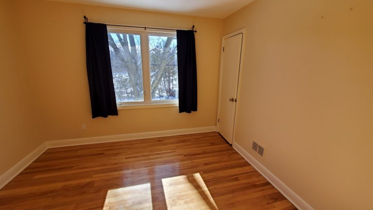 Bedroom 2 (11`x 11'3") - windows facing back yard