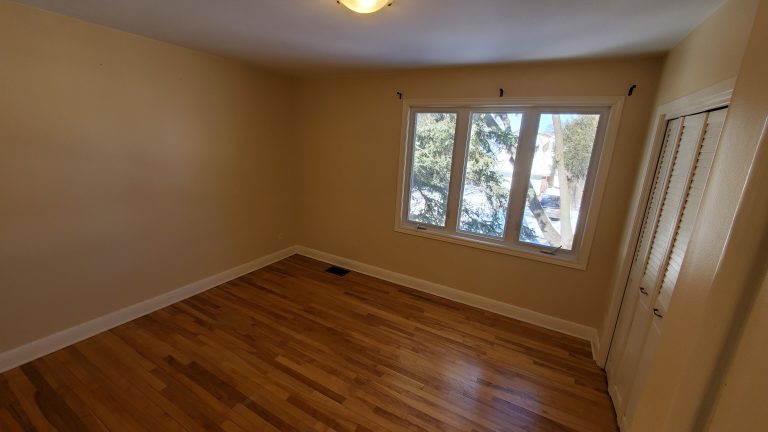 Master bedroom (12`x 11'3") - windows facing Braydon Ave.