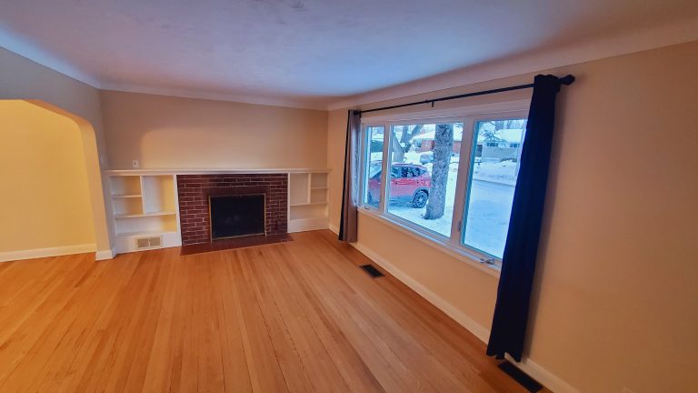 Living room with decorative fireplace